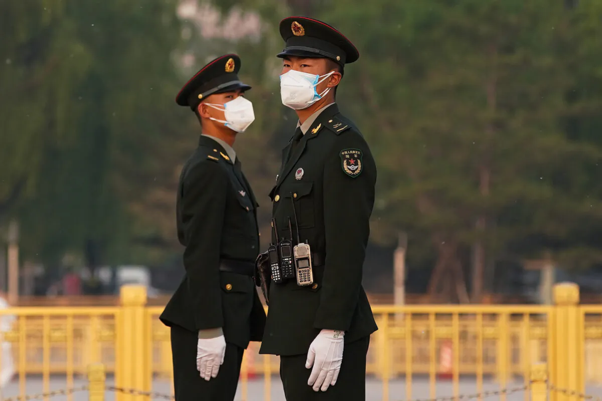 Chinese paramilitary soldiers stand in Tiananmen Square in Beijing on April 28, 2020. (Lintao Zhang/Getty Images)