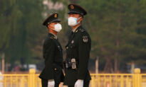 Beijing, on High Alert as Virus Spreads, Monitors Close Contacts of Those Infected