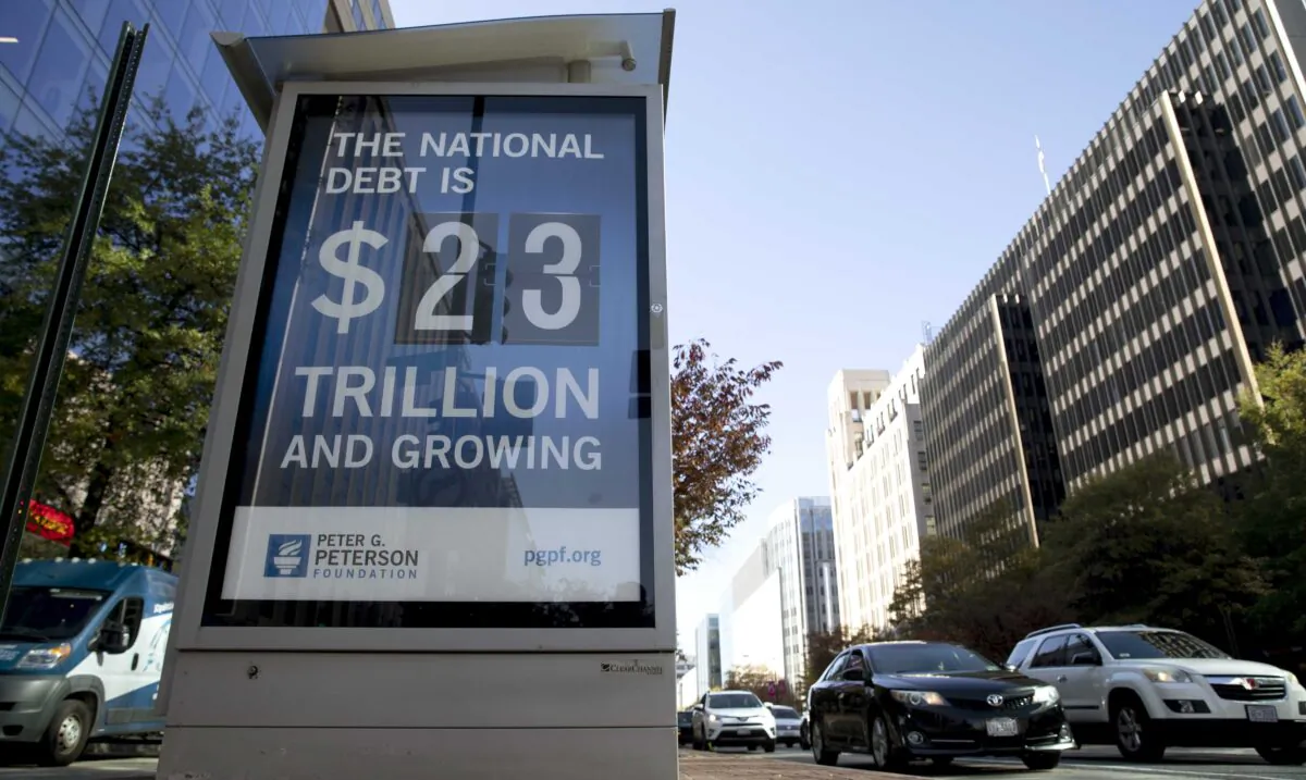 A sign showing the national debt is displayed in Washington, D.C., on Nov. 6, 2019. The current figure is almost $26.5 trillion. (Tasos Katopodis/Getty Images for PGPF)