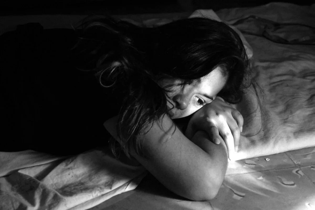 A file photo shows a teenager exhibiting signs of depression. (Mxsh/Unsplash)