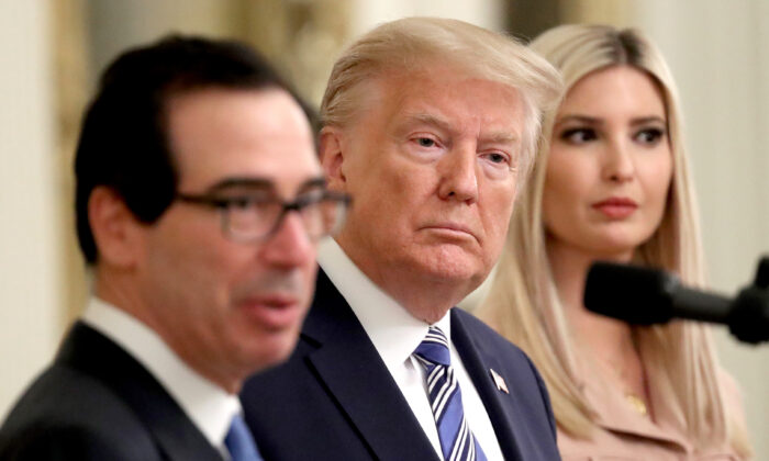 President Donald Trump and his daughter Ivanka listen as Treasury Secretary Steven Mnuchin speaks during an event on supporting small businesses through the Paycheck Protection Program in the East Room of the White House on April 28, 2020. (Win McNamee/Getty Images)