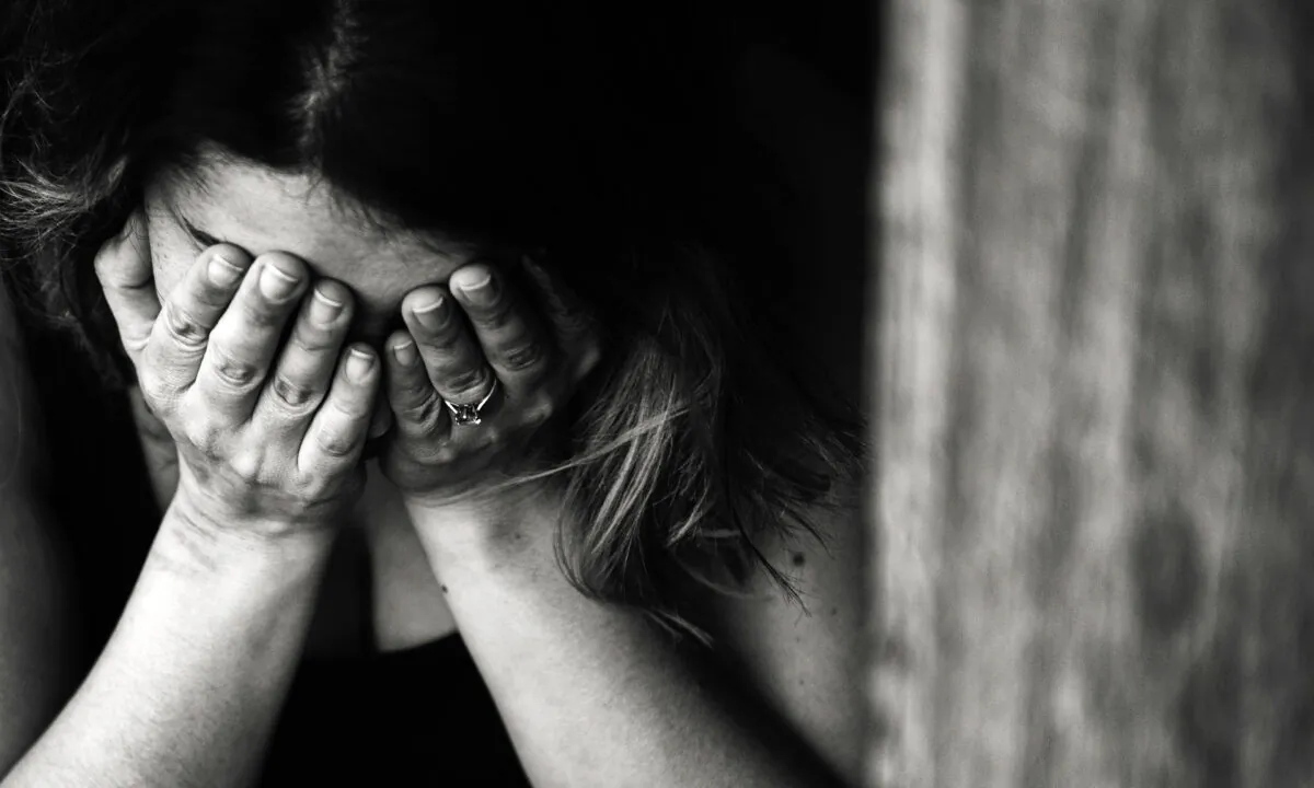 A woman reacts emotionally to stress in a file photo. (Kat Jayne/Pexels)