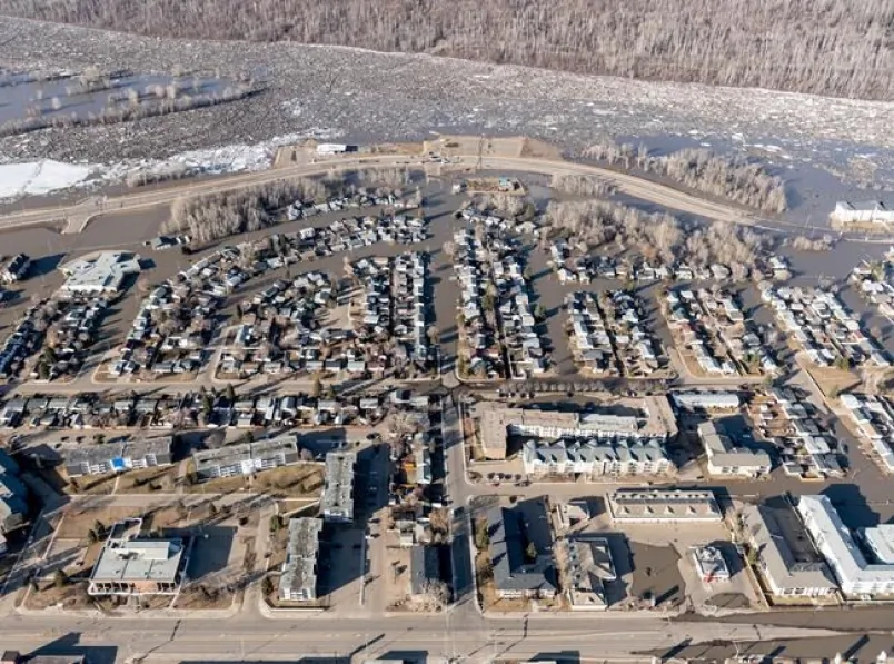 A flooded neighbourhood along the Clearwater River in downtown Fort McMurray, Alberta is shown on Tuesday, April 28, 2020. Officials in Fort McMurray are keeping a close eye on river levels after a 25-kilometre ice jam caused major flooding and forced about 12,000 people from their homes. (Greg Halinda/The Canadian Press)