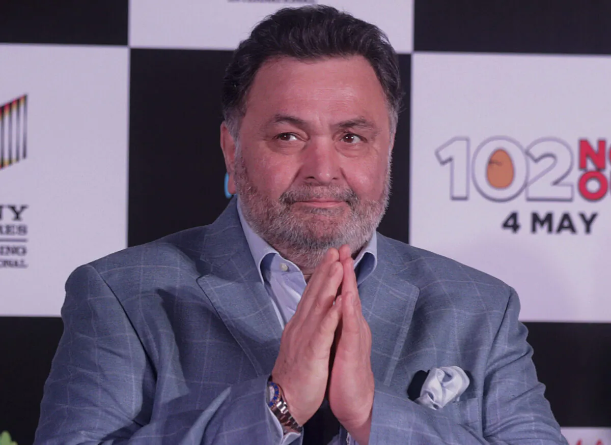 Bollywood actor Rishi Kapoor greets media as he arrives for the launch of film "102 Not Out" in Mumbai, India, on April 19, 2018. (Rafiq Maqbool/File/AP Photo)