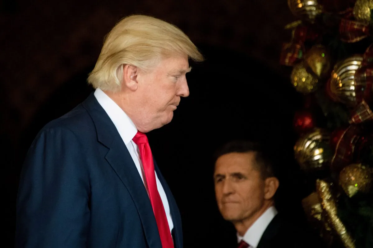President-elect Donald Trump, left, stands withNational Security Adviser Lt. General Michael Flynn at Mar-a-Lago in Palm Beach, Florida on Dec. 21, 2016. (Jim Watson/AFP via Getty Images)