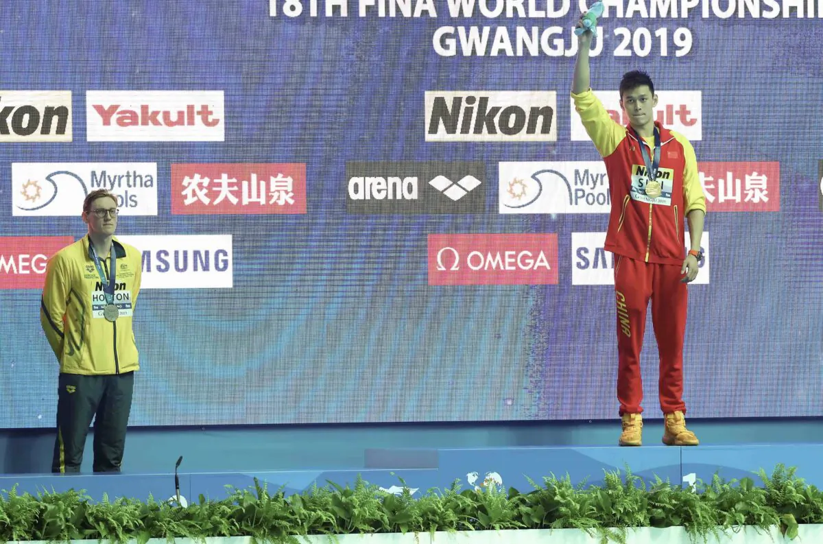 (L-R) Silver medalist Mack Horton of Australia and gold medalist Sun Yang of China pose during the medal ceremony for the Men's 400m Freestyle Final on day one of the Gwangju 2019 FINA World Championships at Nambu International Aquatics Centre in Gwangju, South Korea on July 21, 2019. (Maddie Meyer/Getty Images)