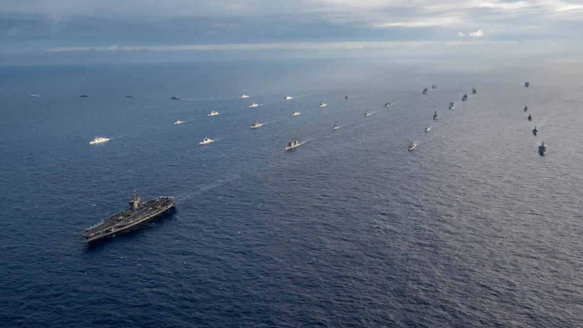 International navy ships perform a controlled breakaway during a photo exercise off the coast of Hawaii for the Rim of Pacific Exercise (RIMPAC) 2018, on July 26, 2018. (U.S. Navy photo by Mass Communication Specialist 3rd Class Dylan M. Kinee/Released)