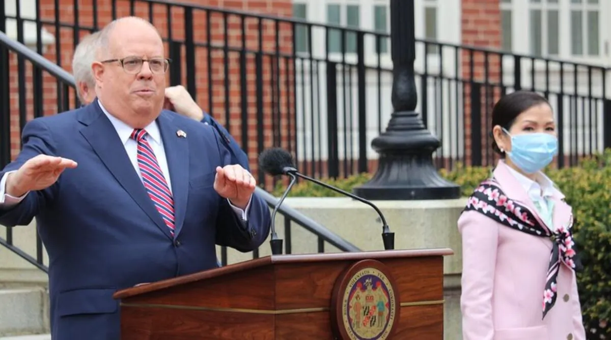 Maryland Gov. Larry Hogan speaks at a news conference in Annapolis, Md. on April 20, 2020, with his wife, Yumi Hogan (R), where the governor announced Maryland has received a shipment from a South Korean company to boost the state's ability to conduct tests for COVID-19 by 500,000. (AP Photo/Brian Witte)

