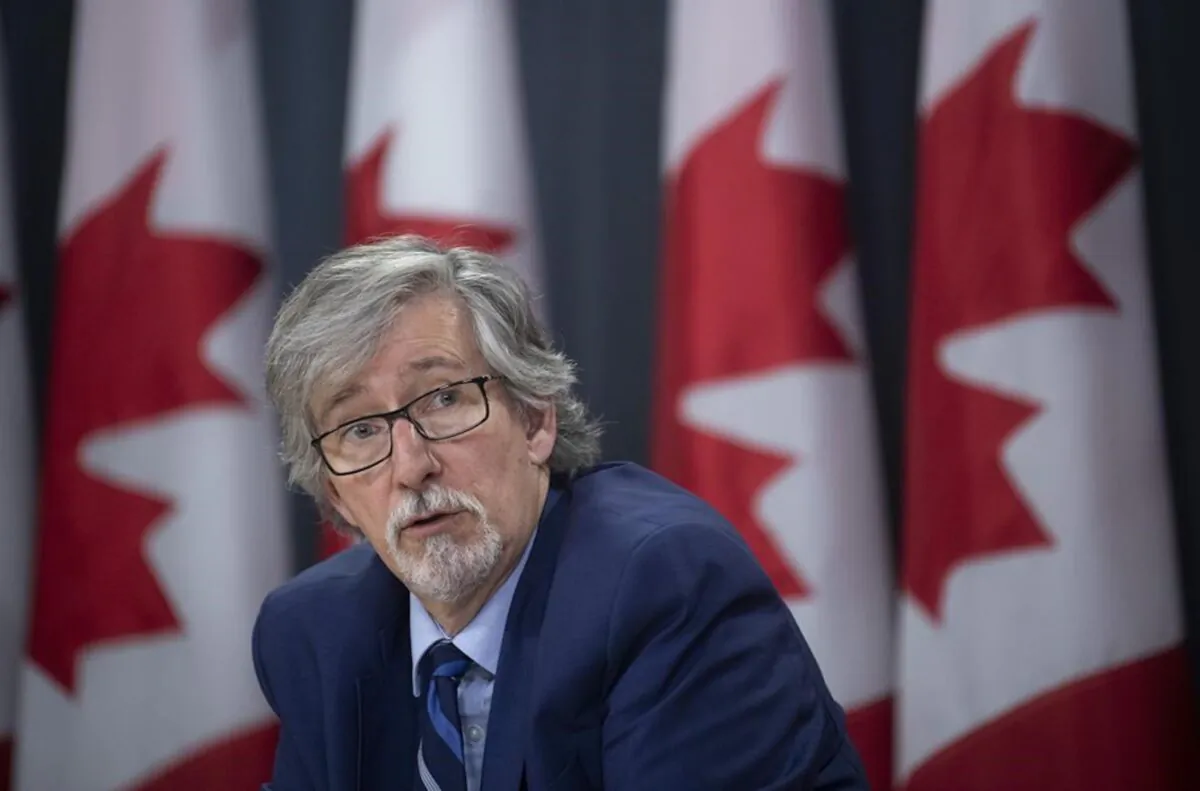 Privacy Commissioner Daniel Therrien speaks during a news conference in Ottawa, Dec. 10, 2019. (Adrian Wyld/The Canadian Press)