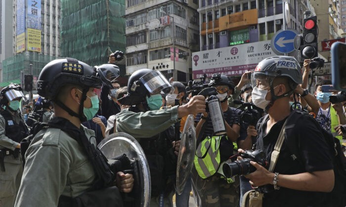 Photojournalist Risks His Life in Hong Kong