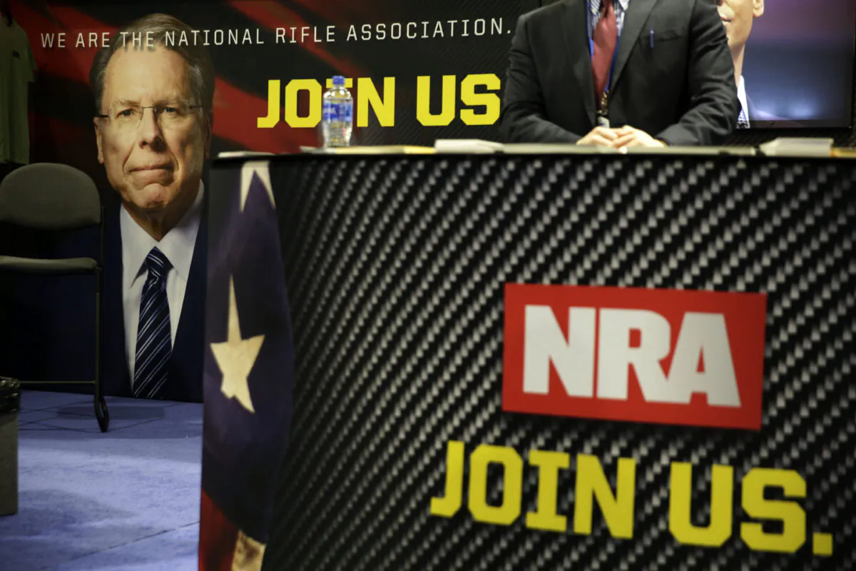 A picture of Wayne LaPierre is seen at the National Rifle Association (NRA) booth during CPAC 2019 in National Harbor, Md., on Feb. 28, 2019. (Alex Wong/Getty Images)