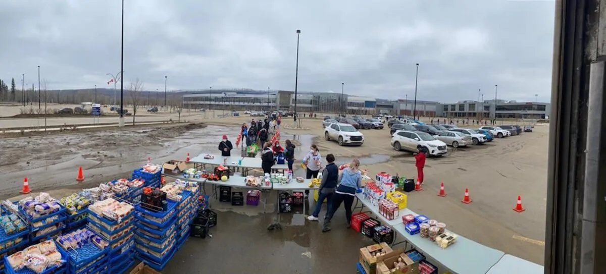 Photo shows the donated food in Fort McMurray after the flood. The Regional Municipality of Wood Buffalo lifted a mandatory evacuation order for five parts of the city late Friday, May 1, 2020, citing receding water levels. An ice jam earlier this week on the Athabasca River led to the flooding of the city’s downtown, forcing close to 13,000 people out of their homes. (The Canadian Press)