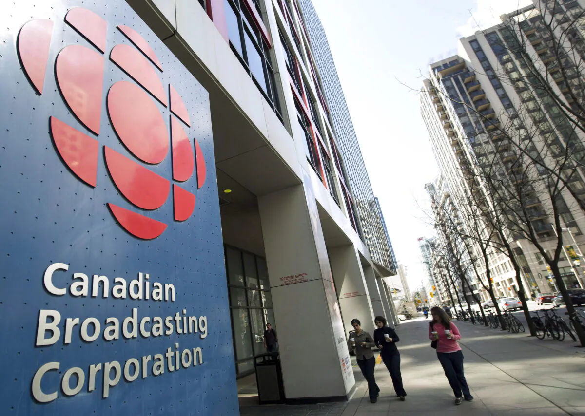 People enter the CBC building in Toronto, in a file photo.  (The Canadian Press/Nathan Denette)