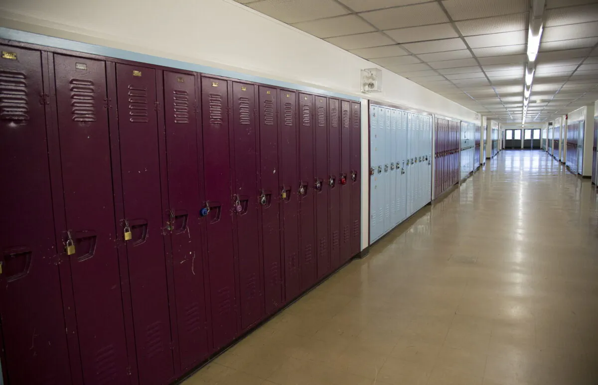 A empty hallway is pictured at a school in a file photo. (Jonathan Hayward/The Canadian Press)