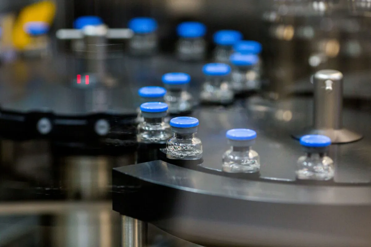 Vials of investigational COVID-19 treatment drug remdesivir are capped at a Gilead Sciences facility in La Verne, Calif., on March 18, 2020. (Gilead Sciences via Reuters)