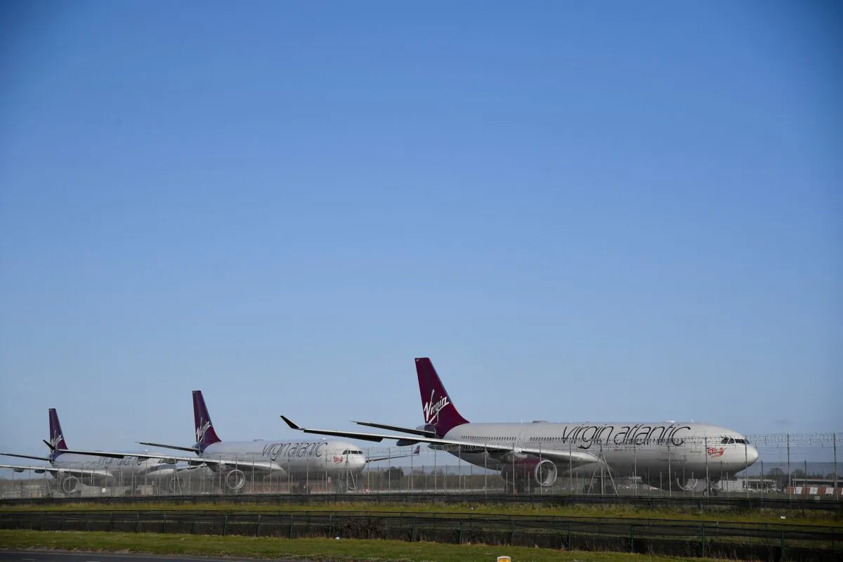 Virgin Atlantic planes are seen at Heathrow airport as the spread of COVID-19 continues, London, UK, March 31, 2020. (Toby Melville/Reuters)