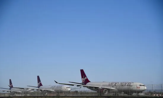 Virgin Atlantic to Cut Jobs, Move Flights From Gatwick to Cut Costs