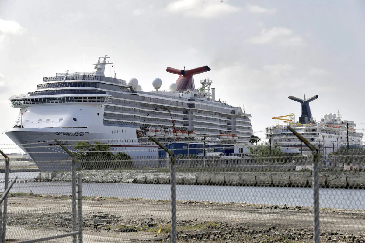 Carnival Cruise ships are docked at the Port of Tampa, in Tampa, Fla. on March 26, 2020. (AP Photo/Chris O'Meara)
