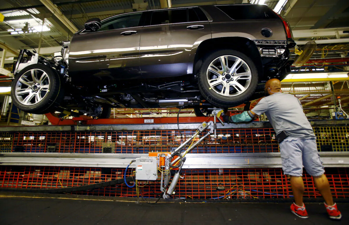 Mike Guillen works on the assembly line at the General Motors Assembly Plant in Arlington, Texas, on June 9, 2015. (Mike Stone/Reuters)