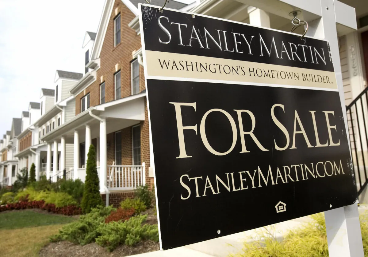 File photo showing a real estate "For Sale" sign on a residential corner in Centreville, Va., on Aug. 29, 2006. (Paul Richards/AFP via Getty Images)