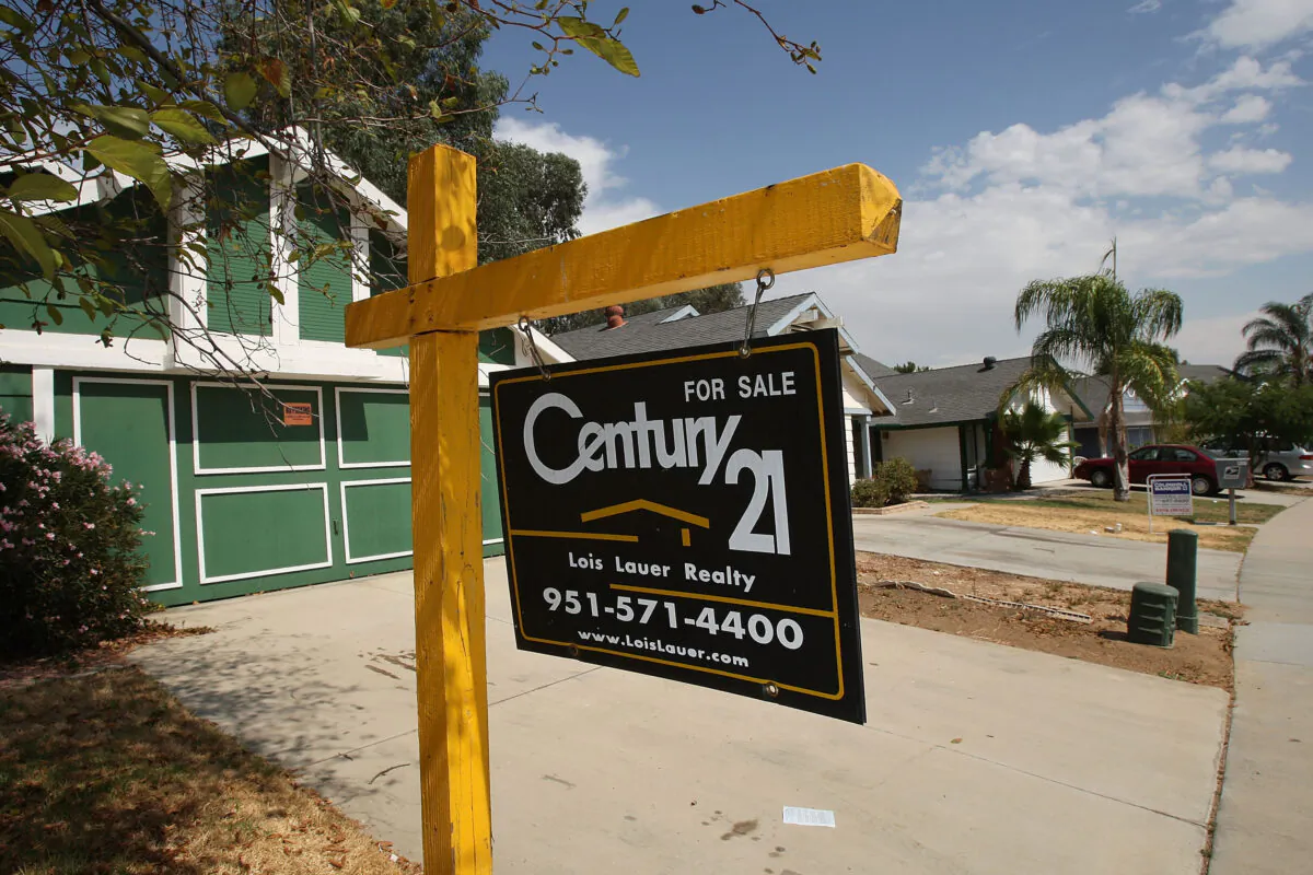 A “For Sale” sign outside a home in Moreno Valley, Calif., on Aug. 25, 2008. (David McNew/Getty Images)