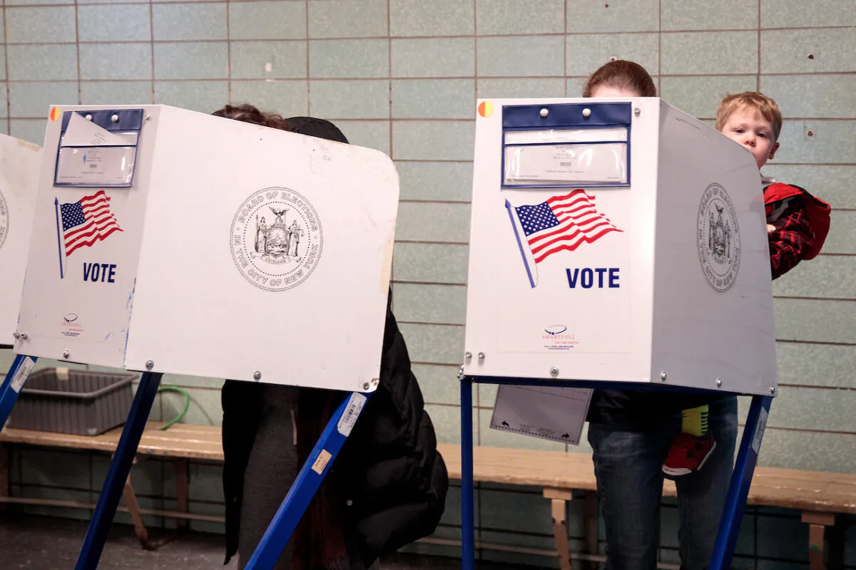People vote at a polling site at a public school in New York City on Nov. 8, 2016. (Drew Angerer/Getty Images)