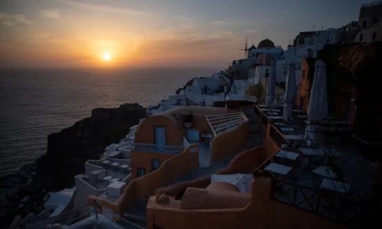 Greece Tourism: Tourists Watch the Iconic Sunset of Santorini