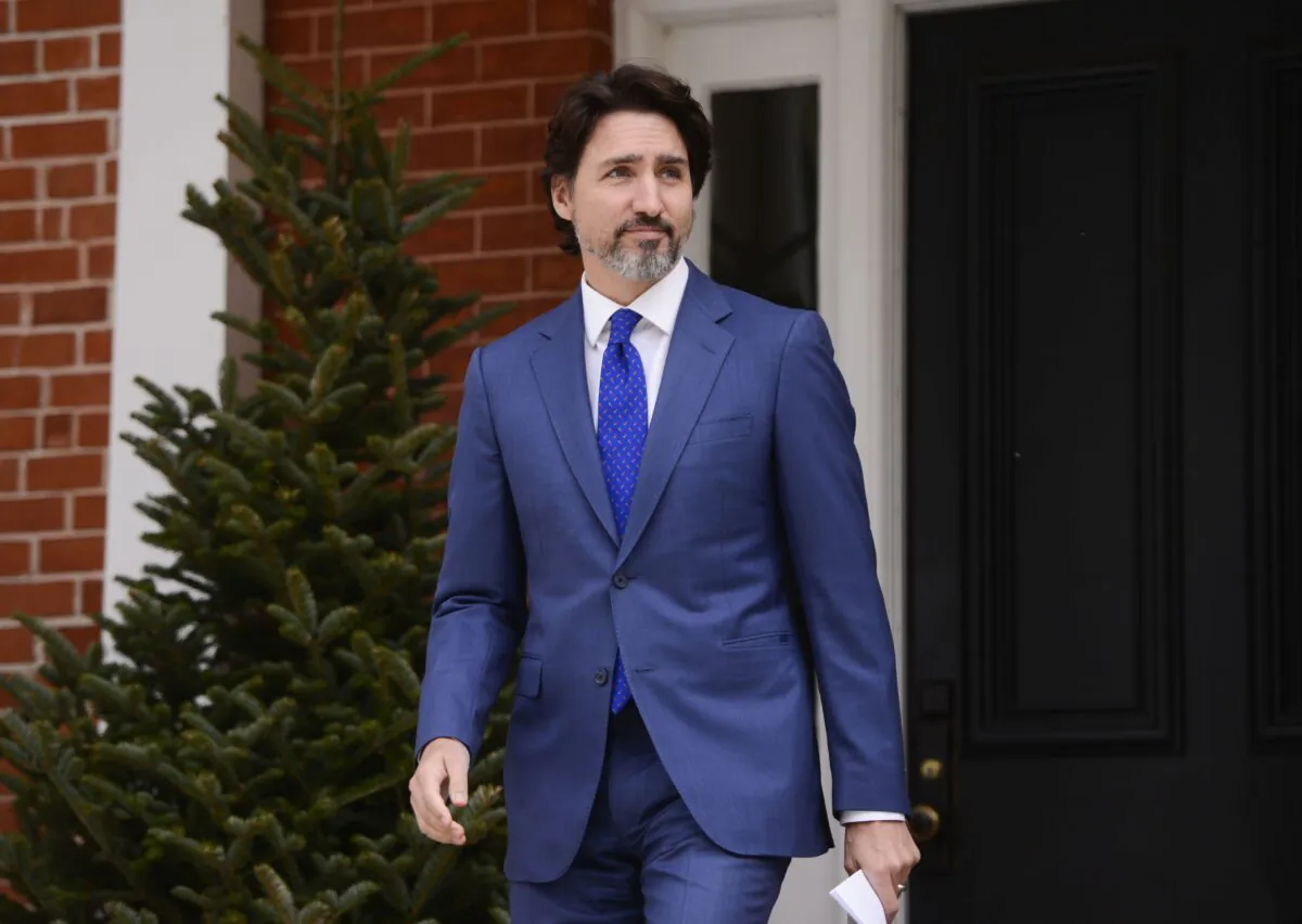 Prime Minister Justin Trudeau prepares to hold a press conference outside Rideau Cottage in Ottawa about the pandemic, on May 7, 2020. (The Canadian Press/Sean Kilpatrick)