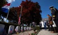 Volunteers Put Faces to Names of Americans in WWII Cemetery