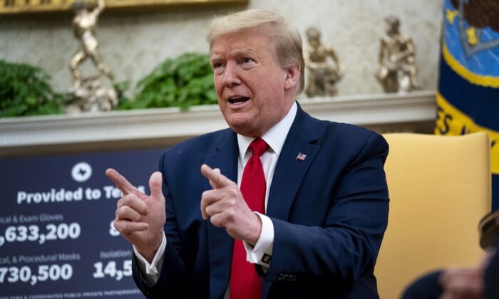 President Donald Trump speaks to reporters while hosting Texas Governor Greg Abbott about what his state has done to restart business during the novel coronavirus pandemic in the Oval Office at the White House in Washington on May 7, 2020. (Doug Mills/Getty Images)