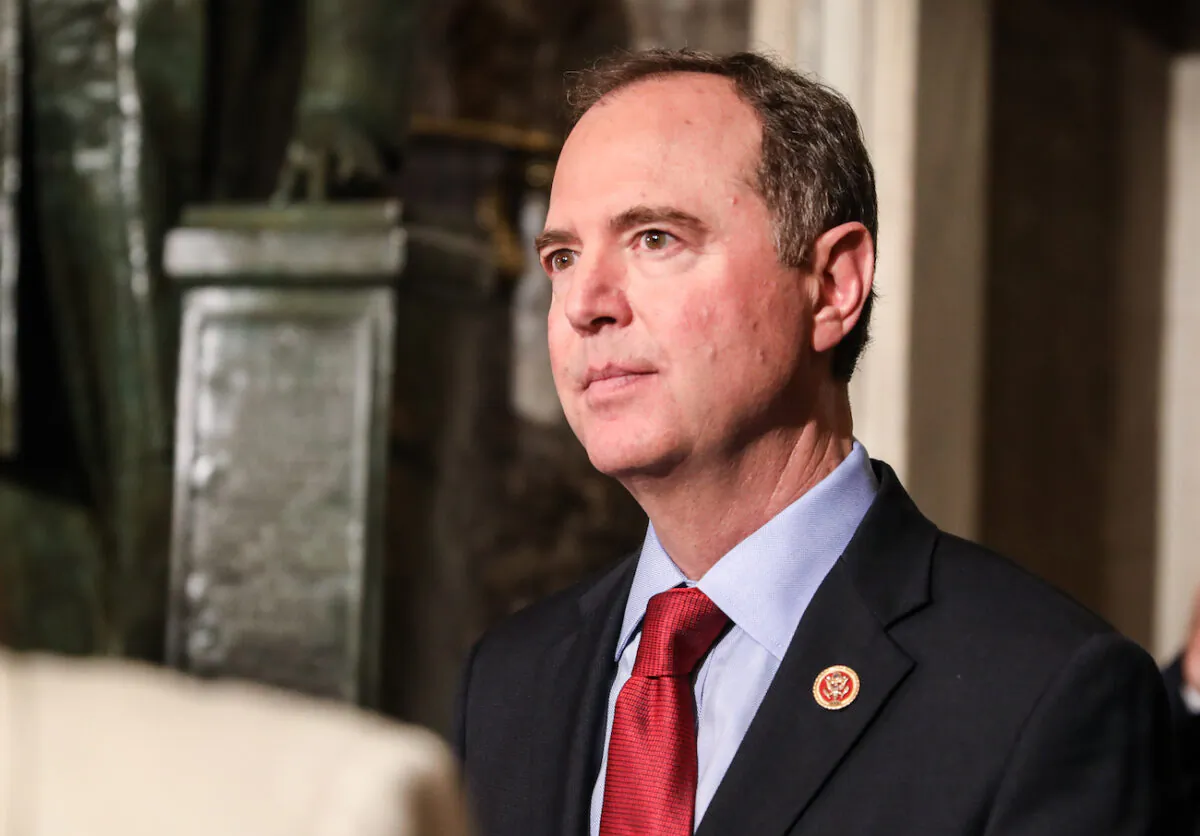 Rep. Adam Schiff (D-Calif.) walks through Statuary Hall to the House Chamber for President Donald Trump’s State of the Union address in the Capitol in Washington on Feb. 4, 2020. (Charlotte Cuthbertson/The Epoch Times)