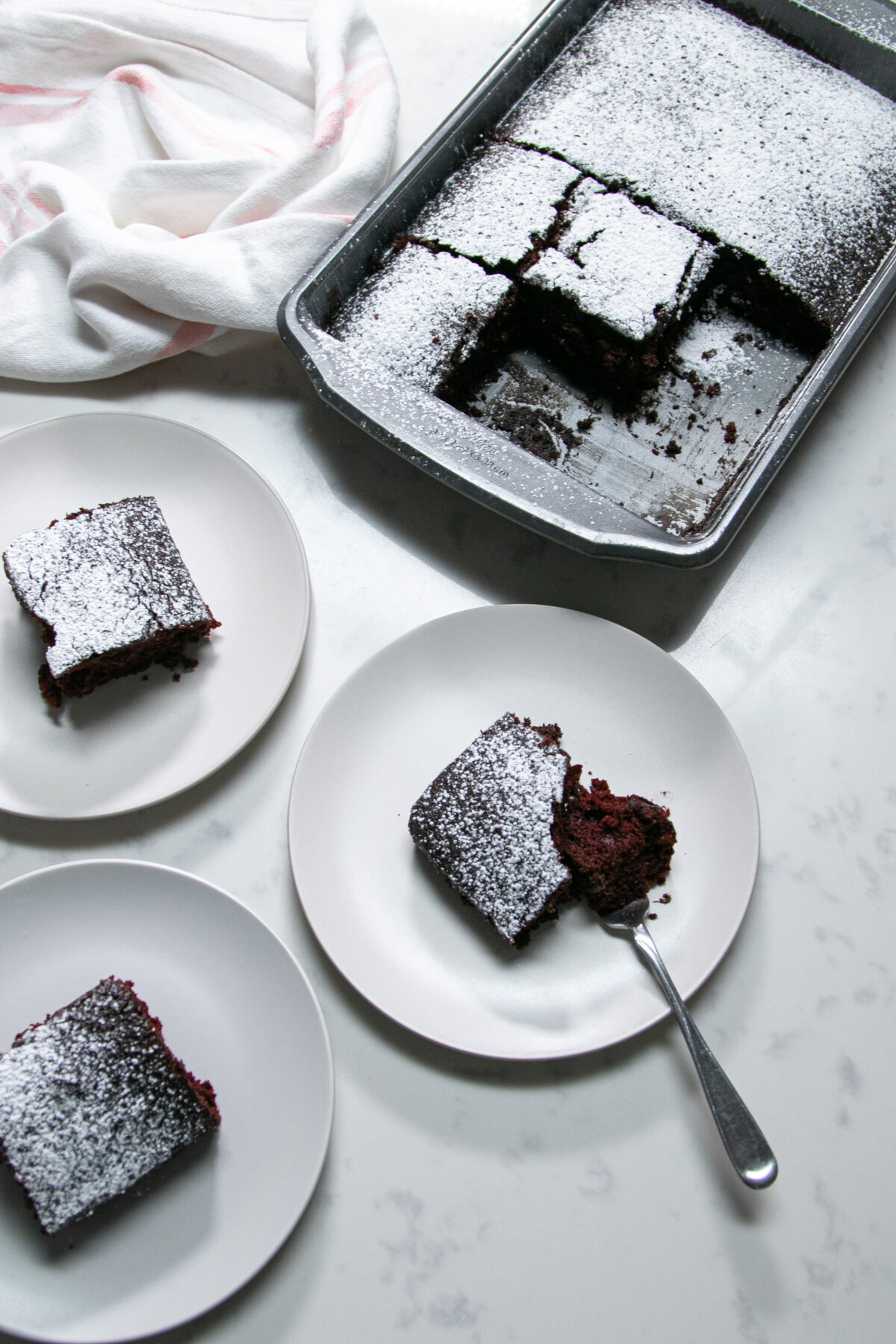 chocolate crazy cake in pan and on plates
