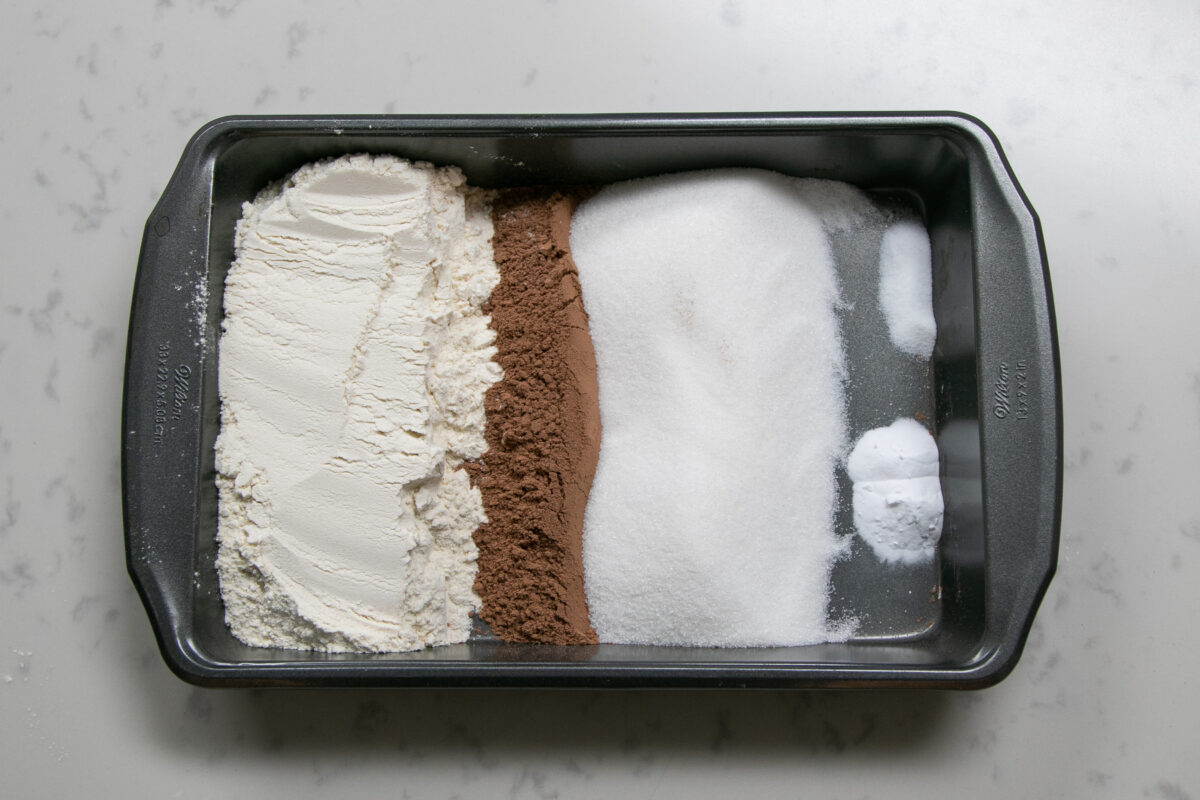 dry ingredients for chocolate crazy cake in pan