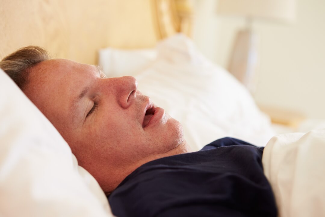 Sleep apnea is more common among overweight people and those suffering from hypertension. (Monkey Business Images/Shutterstock)