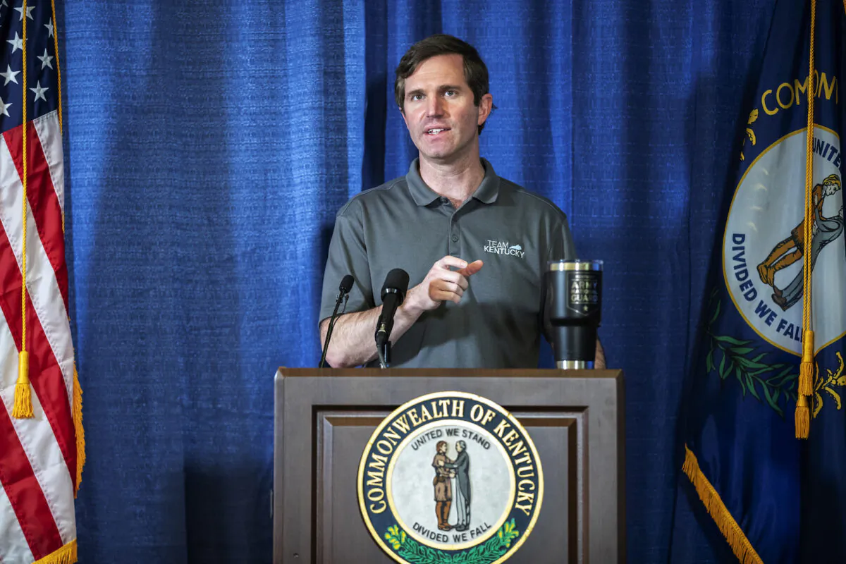 Kentucky Gov. Andy Beshear speaks during a news conference at the state's Emergency Operations Center at the Boone National Guard Center in Frankfort, Ky., about the pandemic situation, on May 3, 2020. (Ryan C. Hermens/Lexington Herald-Leader via AP)