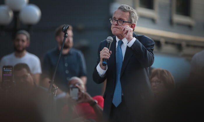 Ohio Gov. Mike DeWine speaks to mourners at a memorial service in the Oregon District held to recognize the victims of an early-morning mass shooting in the popular nightspot on Aug. 04, 2019 in Dayton, Ohio. (Scott Olson/Getty Images)