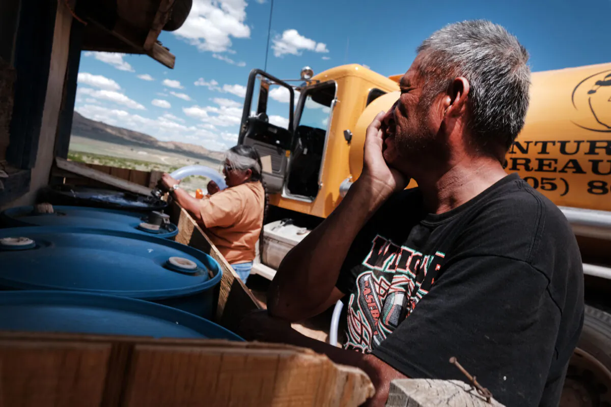 A member of the Navajo Nation receives a water delivery in the town of in Thoreau, New Mexico, on June 06, 2019. (Spencer Platt/Getty Images)
