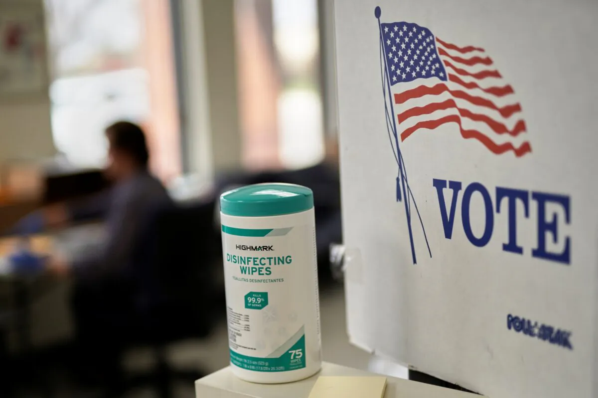 Disinfecting wipes stand at the ready at the Lancaster County Election Committee offices in Lincoln, Neb., on April 14, 2020. (Nati Harnik/AP Photo)