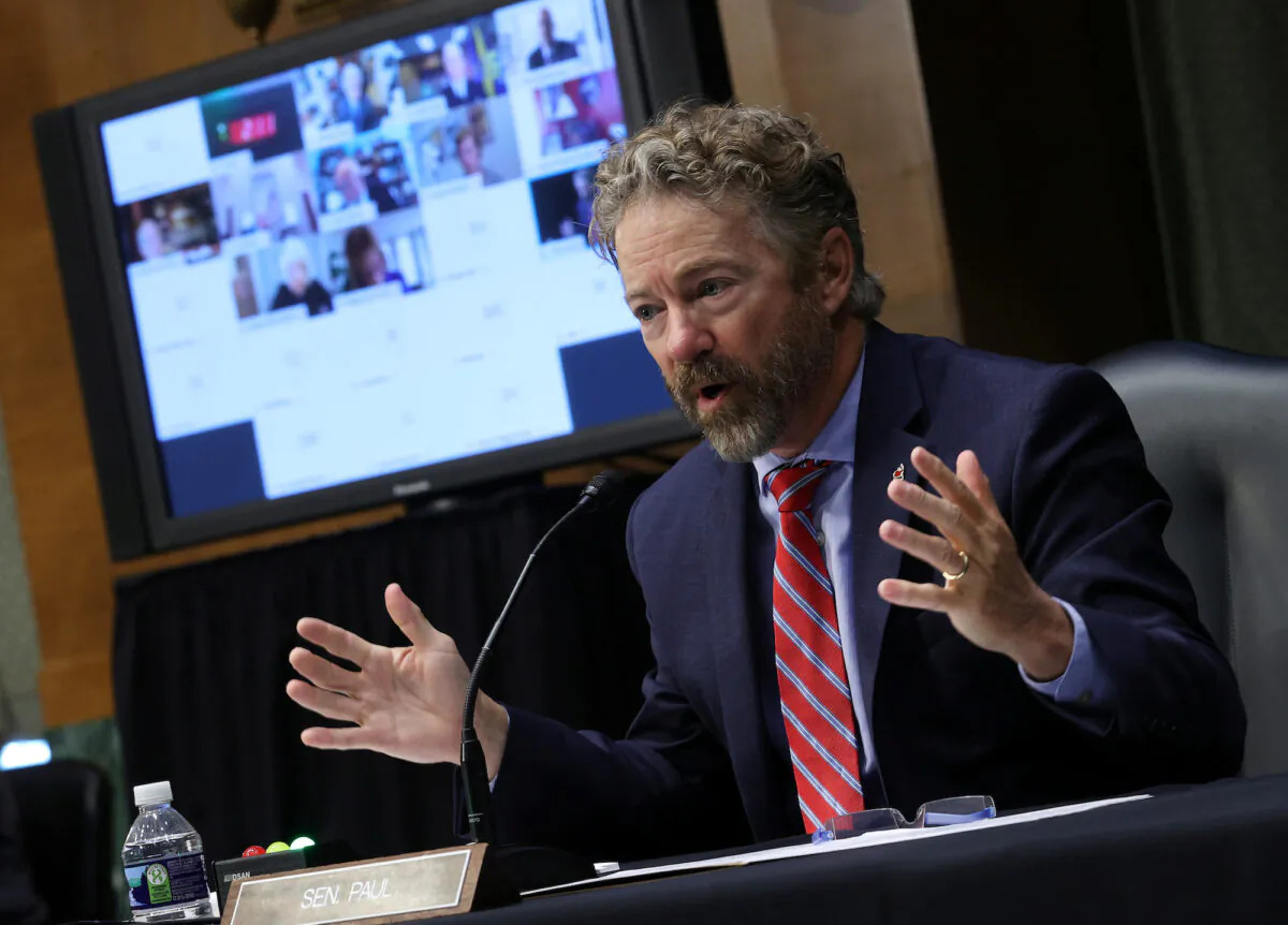 Sen. Rand Paul (R-Ky.) participates in the Senate Committee for Health, Education, Labor, and Pensions hearing on the COVID-19 response, in Washington on May 12, 2020. (Win McNamee/Reuters)