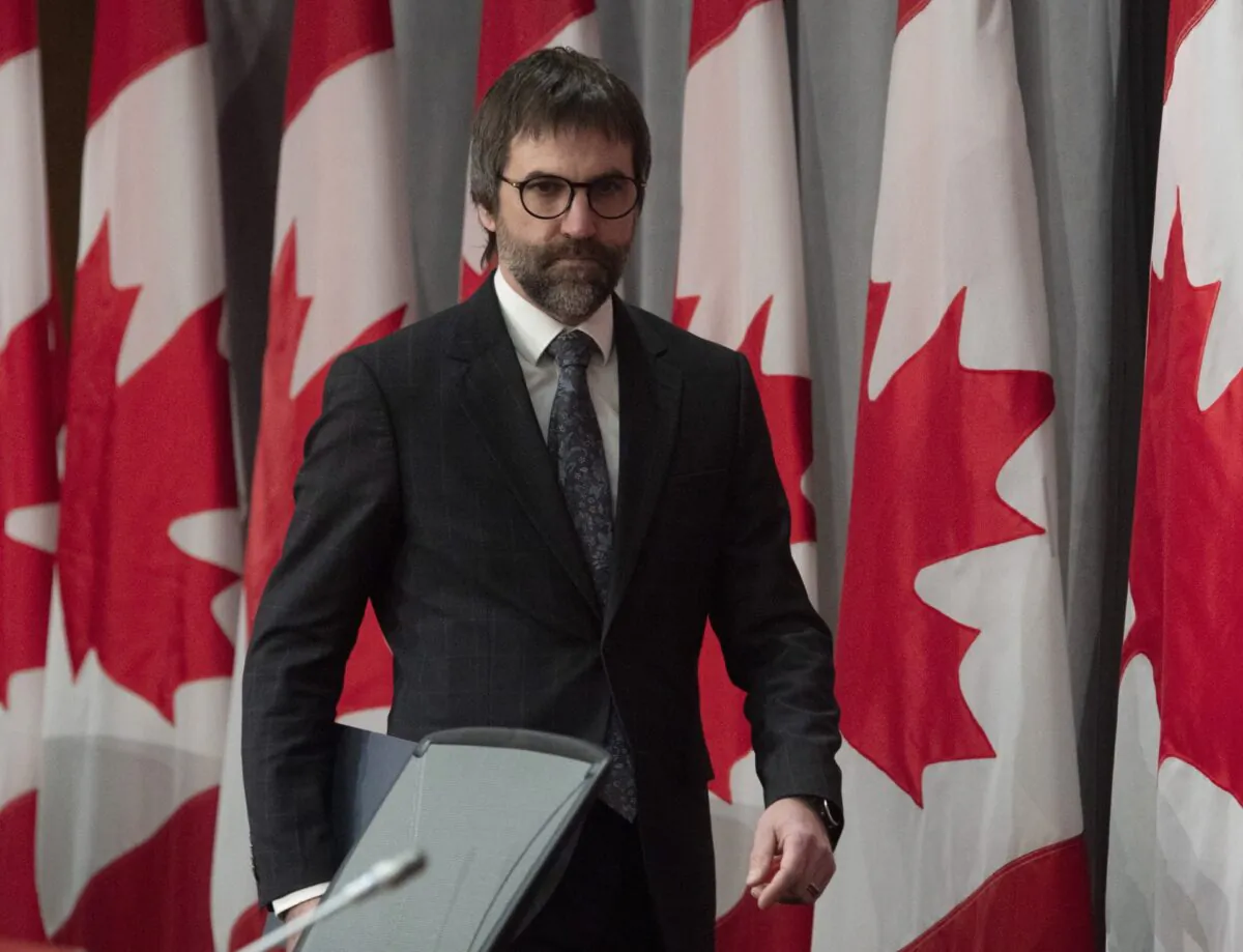 Minister of Canadian Heritage Steven Guilbeault makes his way to his seat for a news conference in Ottawa, Canada, on April 17, 2020. (Adrian Wyld/The Canadian Press)