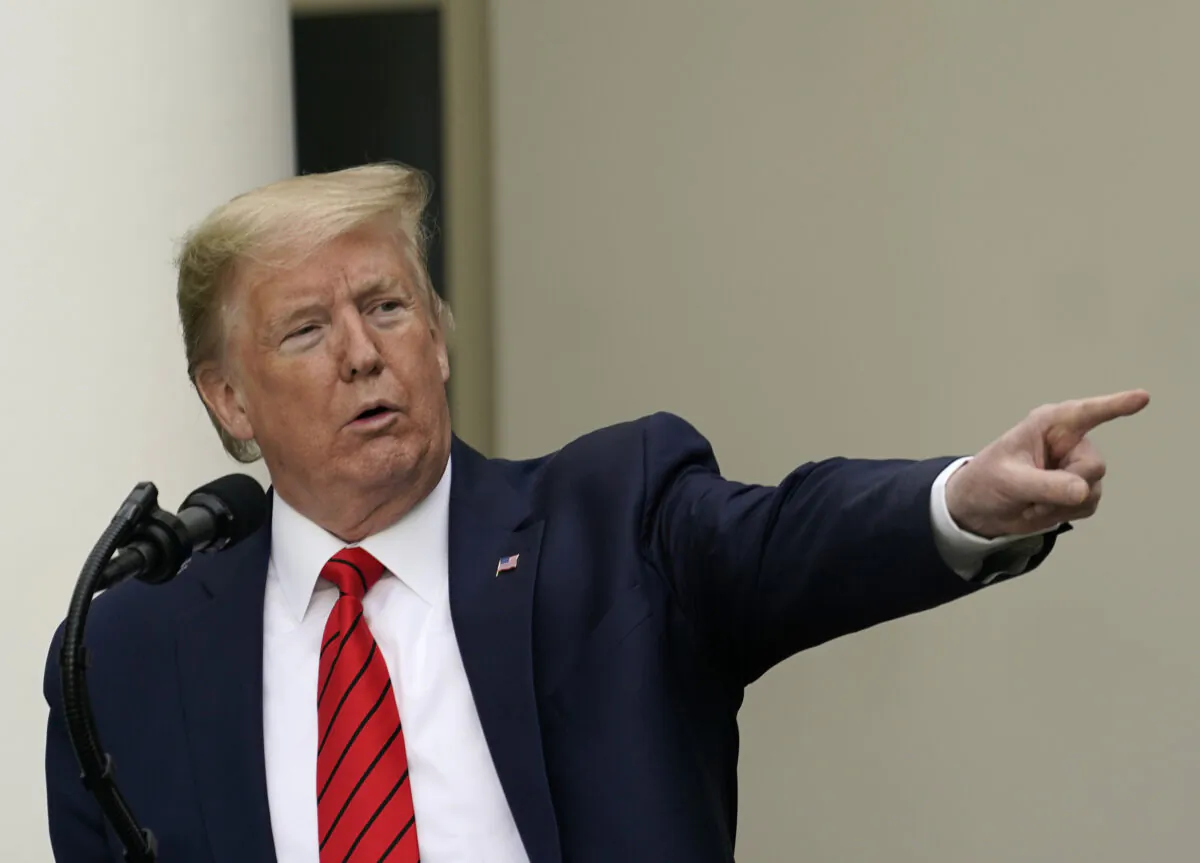 President Donald Trump speaks during a press briefing about CCP virus testing in the Rose Garden of the White House on May 11, 2020. (Drew Angerer/Getty Images)