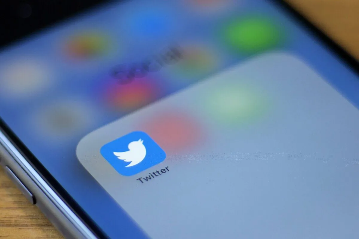 The Twitter logo is seen on a phone in this photo illustration in Washington, on July 10, 2019. (Alastair Pike/AFP via Getty Images)