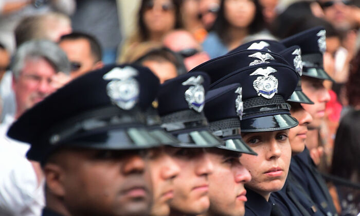 In this file photo, police recruits attend their graduation ceremony at LAPD Headquarters in Los Angeles on July 8, 2016. (Frederic J. Brown/AFP via Getty Images)