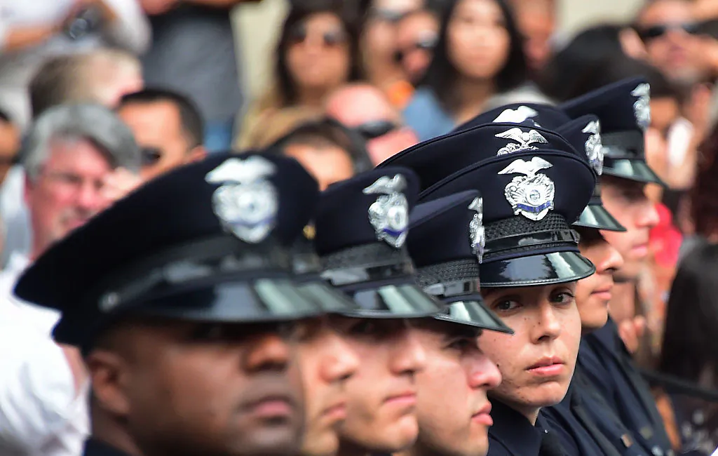 In this file photo, police recruits attend their graduation ceremony at LAPD Headquarters in Los Angeles on July 8, 2016. (Frederic J. Brown/AFP via Getty Images)