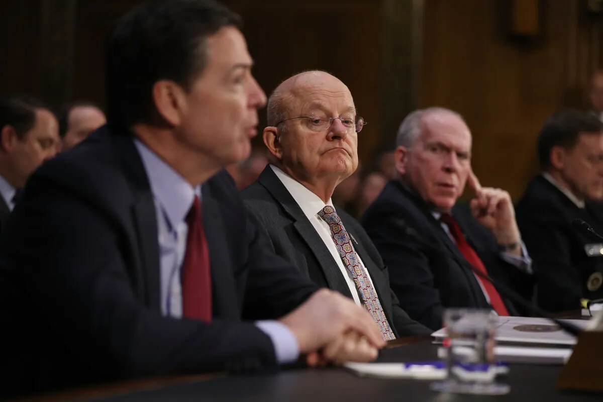 Then-FBI Director James Comey, Director of National Intelligence James Clapper, and  Central Intelligence Agency Director John Brennan (L-R) testify before the Senate (Select) Intelligence Committee in the Dirksen Senate Office Building on Capitol Hill in Washington on Jan. 10, 2017. (Joe Raedle/Getty Images)