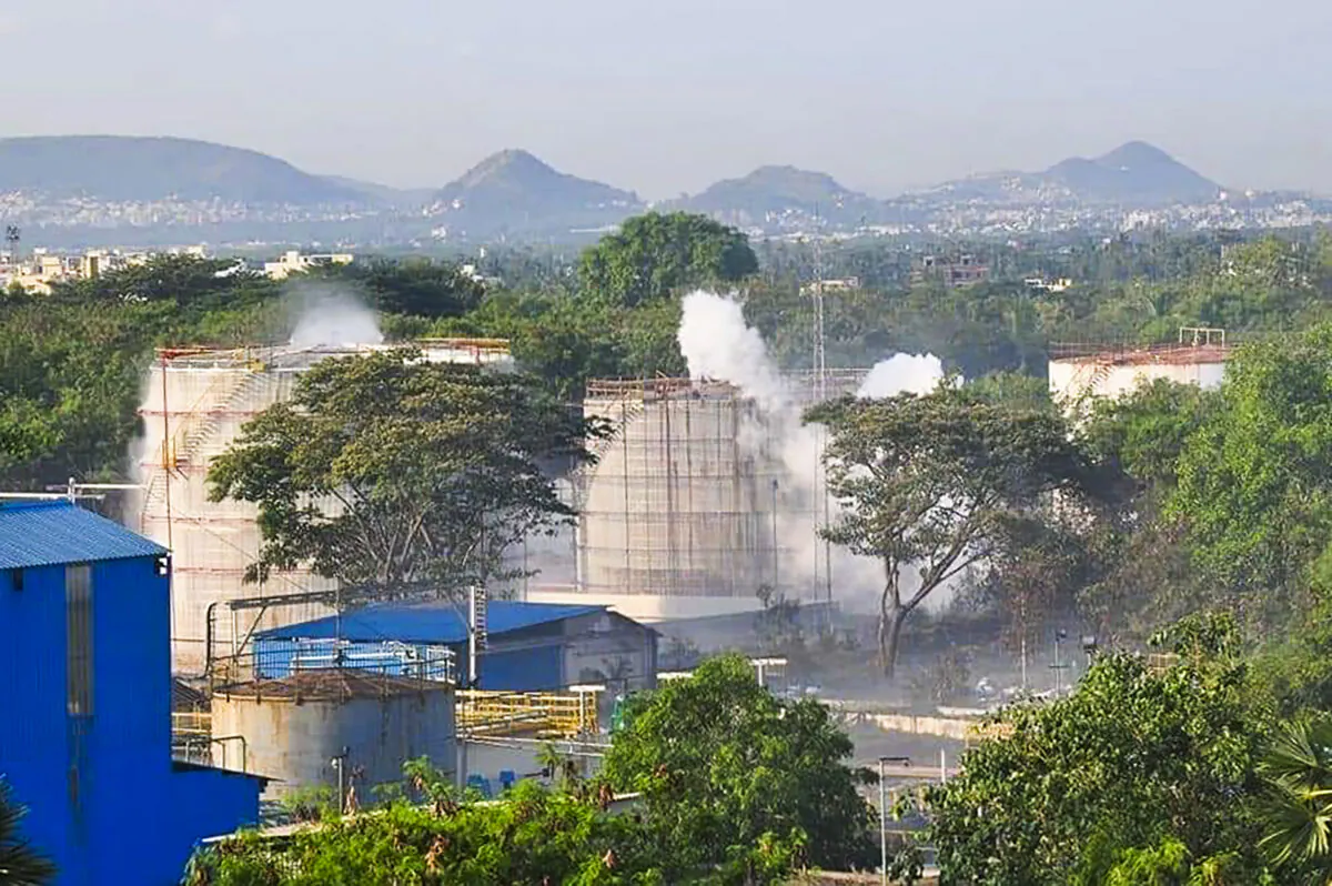 Smokes rise from an LG Polymers plant following a gas leak incident in Visakhapatnam on May 7, 2020. (-/AFP via Getty Images)