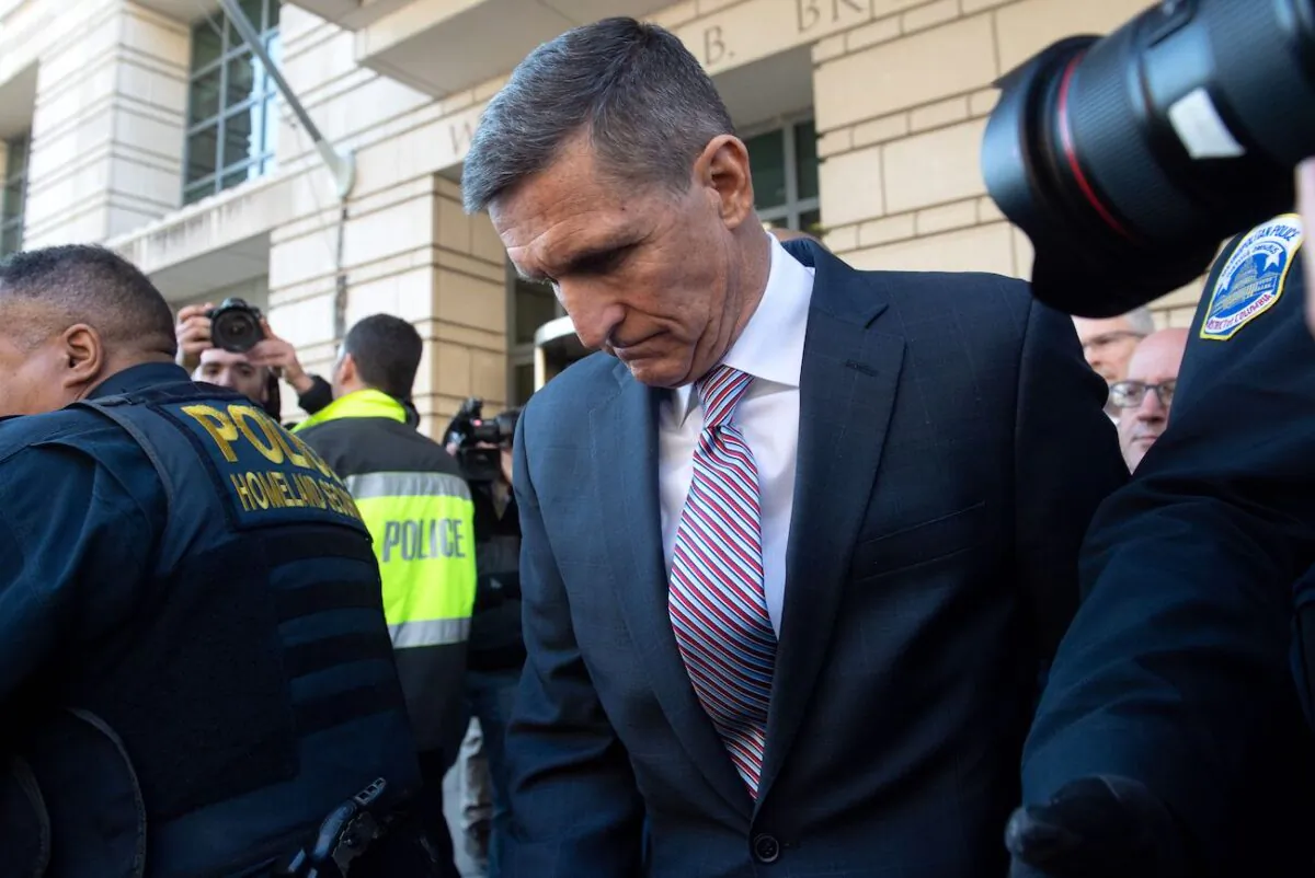 Former National Security Adviser Lt. Gen. Michael Flynn leaves after the delay in his sentencing hearing at U.S. District Court in Washington on Dec. 18, 2018. (Saul Loeb/AFP via Getty Images)