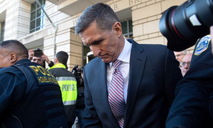 Former National Security Adviser Lt. Gen. Michael Flynn leaves after the delay in his sentencing hearing at U.S. District Court in Washington on Dec. 18, 2018. (Saul Loeb/AFP via Getty Images)