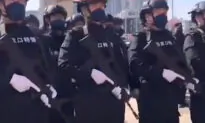 Armed Police Patrol Parts of Beijing As Pandemic Spreads