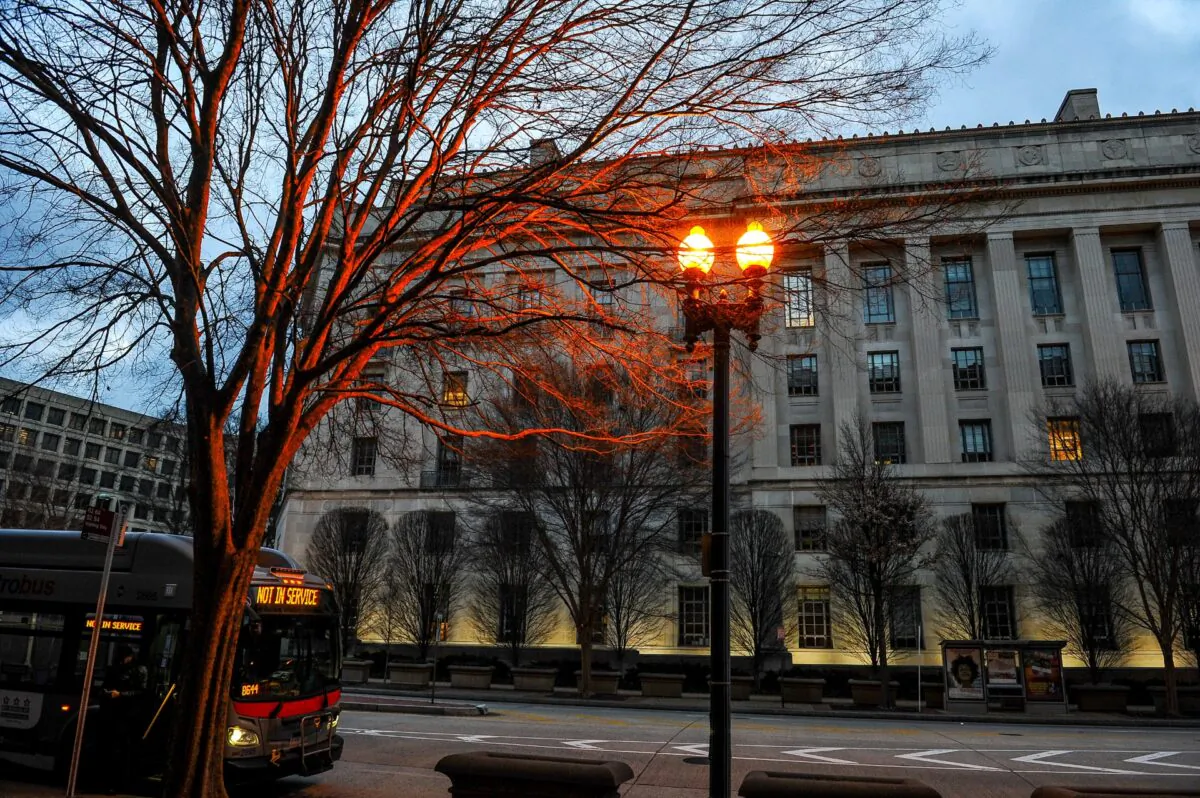 The U.S. Department of Justice building is bathed in morning light at sunrise in Washington, on Feb. 14, 2020. (Mary F. Calvert/Reuters)